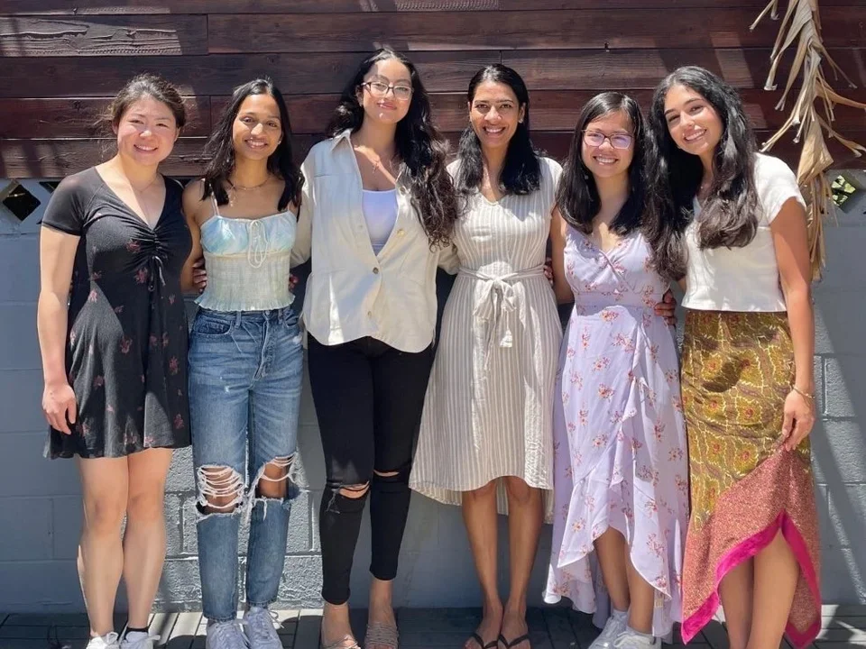 Six Ajijola Lab Members posing together.