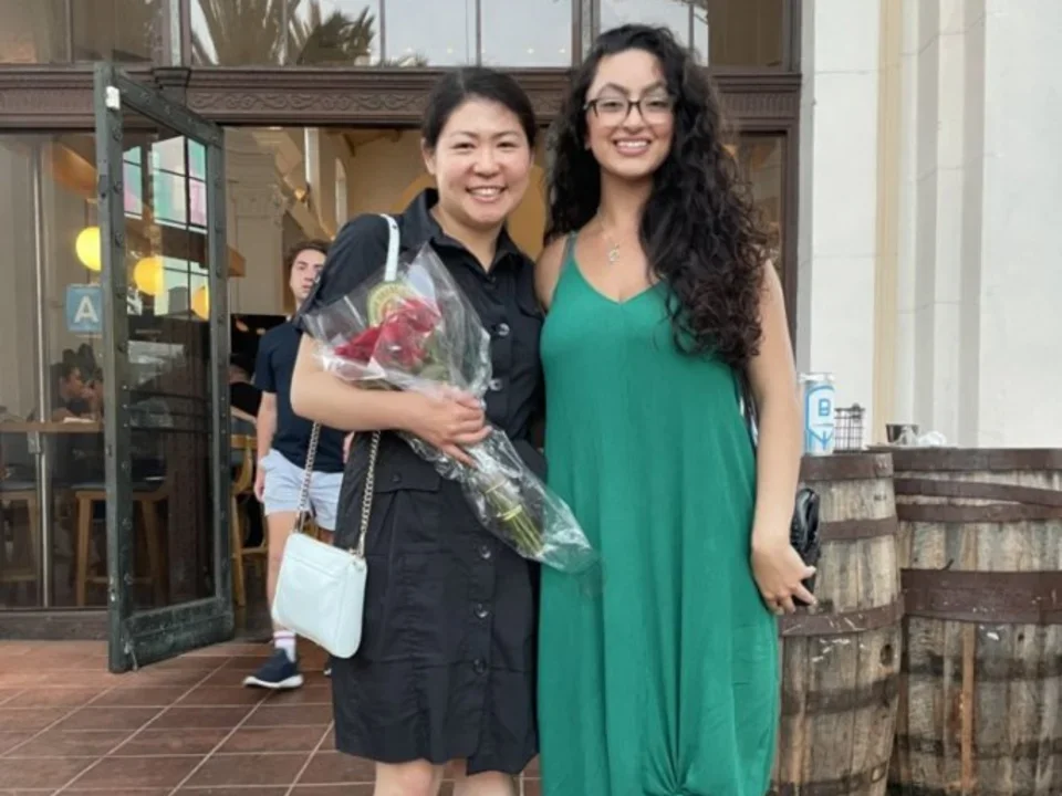 Youstina Labib and lab member at Broxton restaurant.