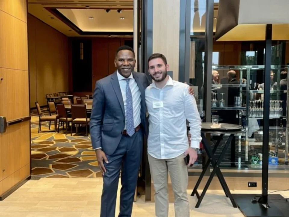 Dr. Ajijola with a Lab Member